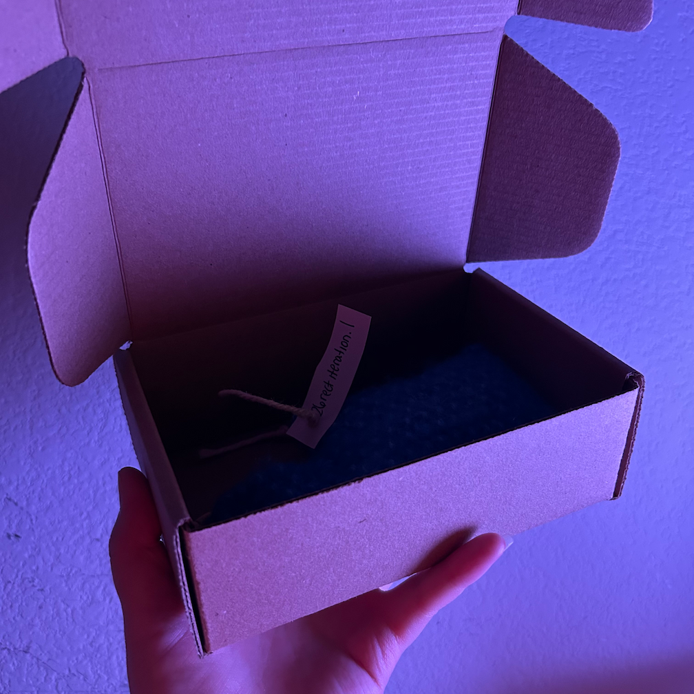 product with tag inside shipping box